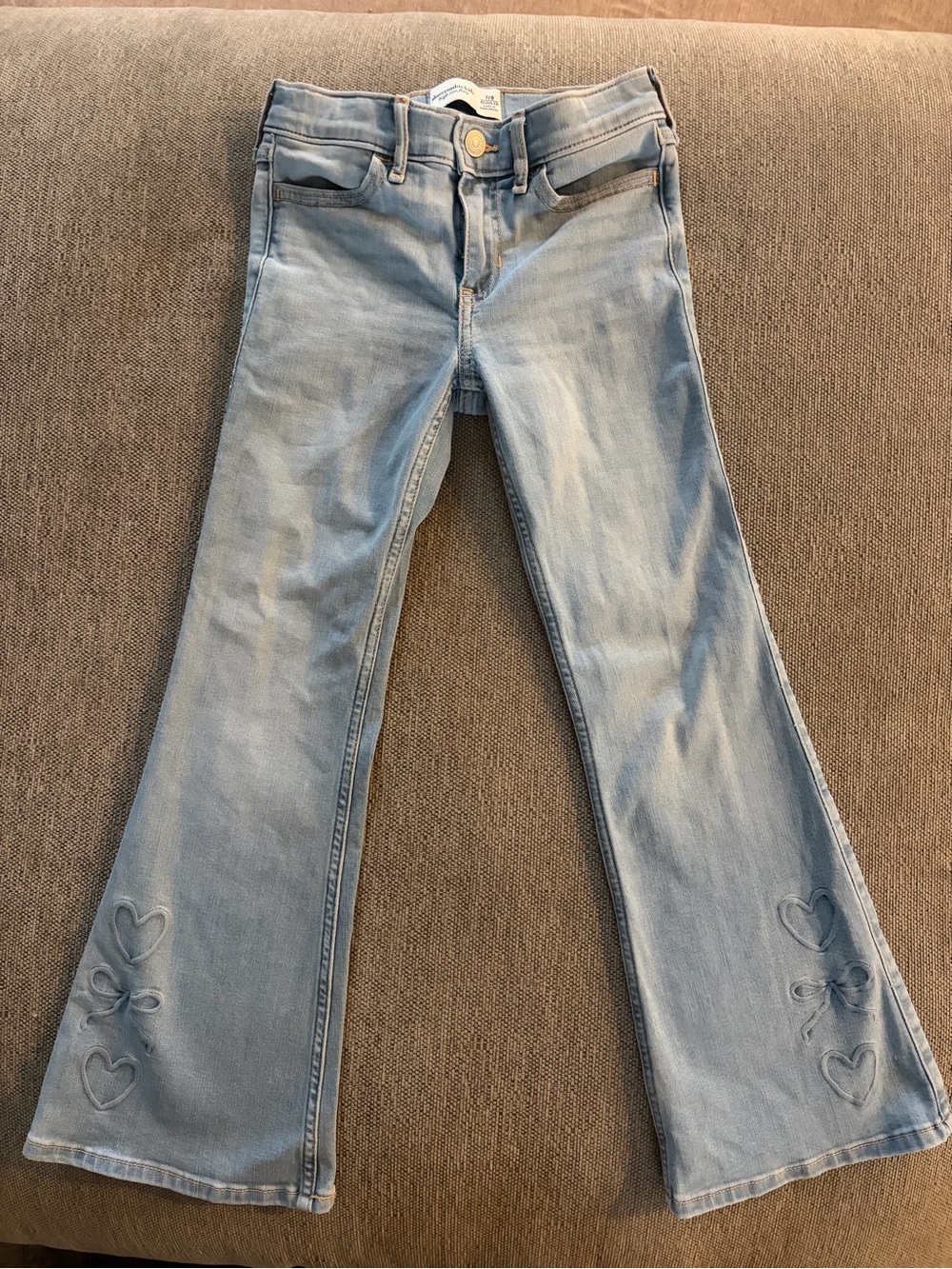 abercrombie kids light blue flared jeans with stitched hearts
